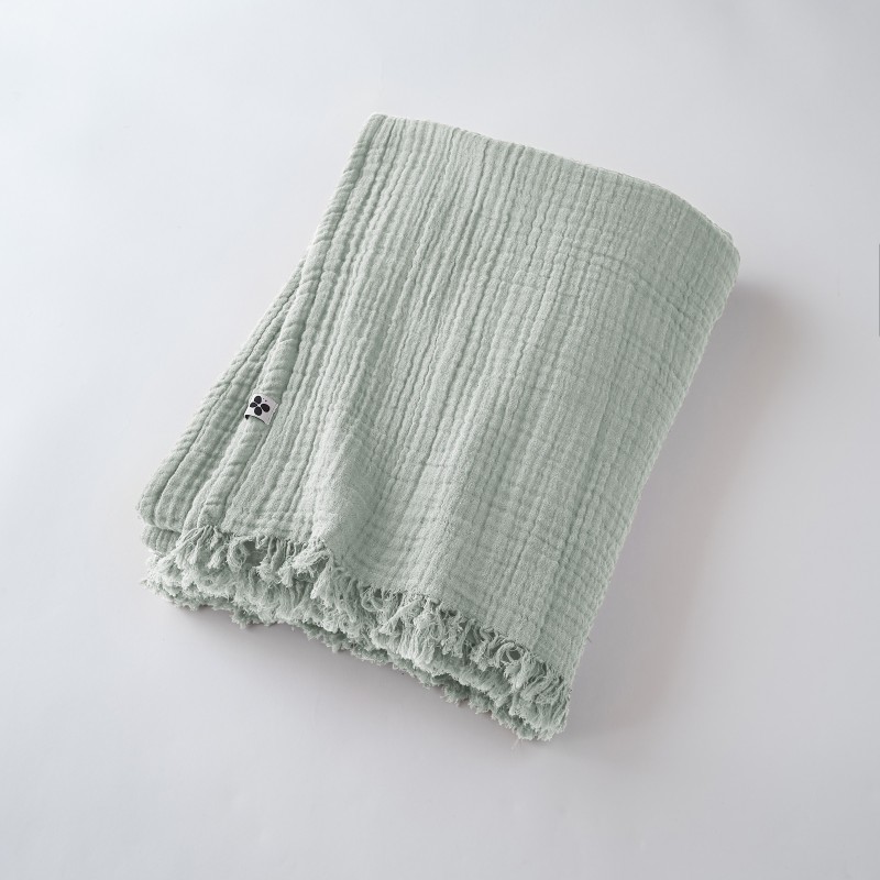 Plaid à franges GAIA en gaze de coton – Douceur et élégance pour votre intérieur